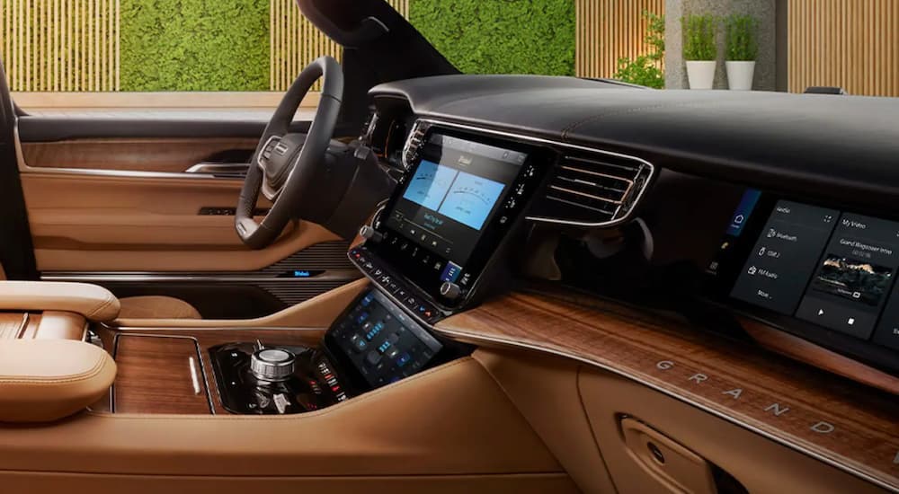 The black and tan interior of a 2022 Grand Wagoneer.