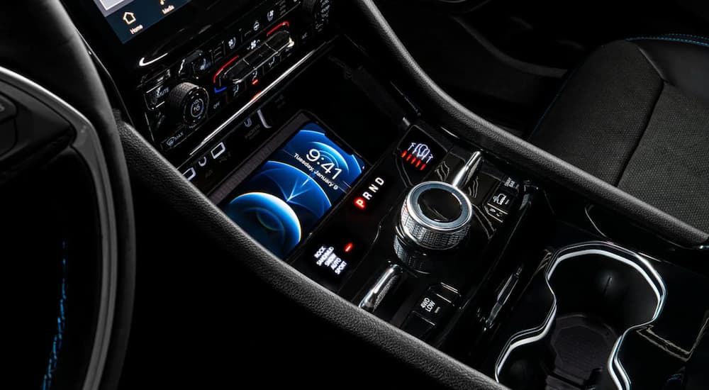 A close-up of the center console in a 2022 Jeep Grand Cherokee L